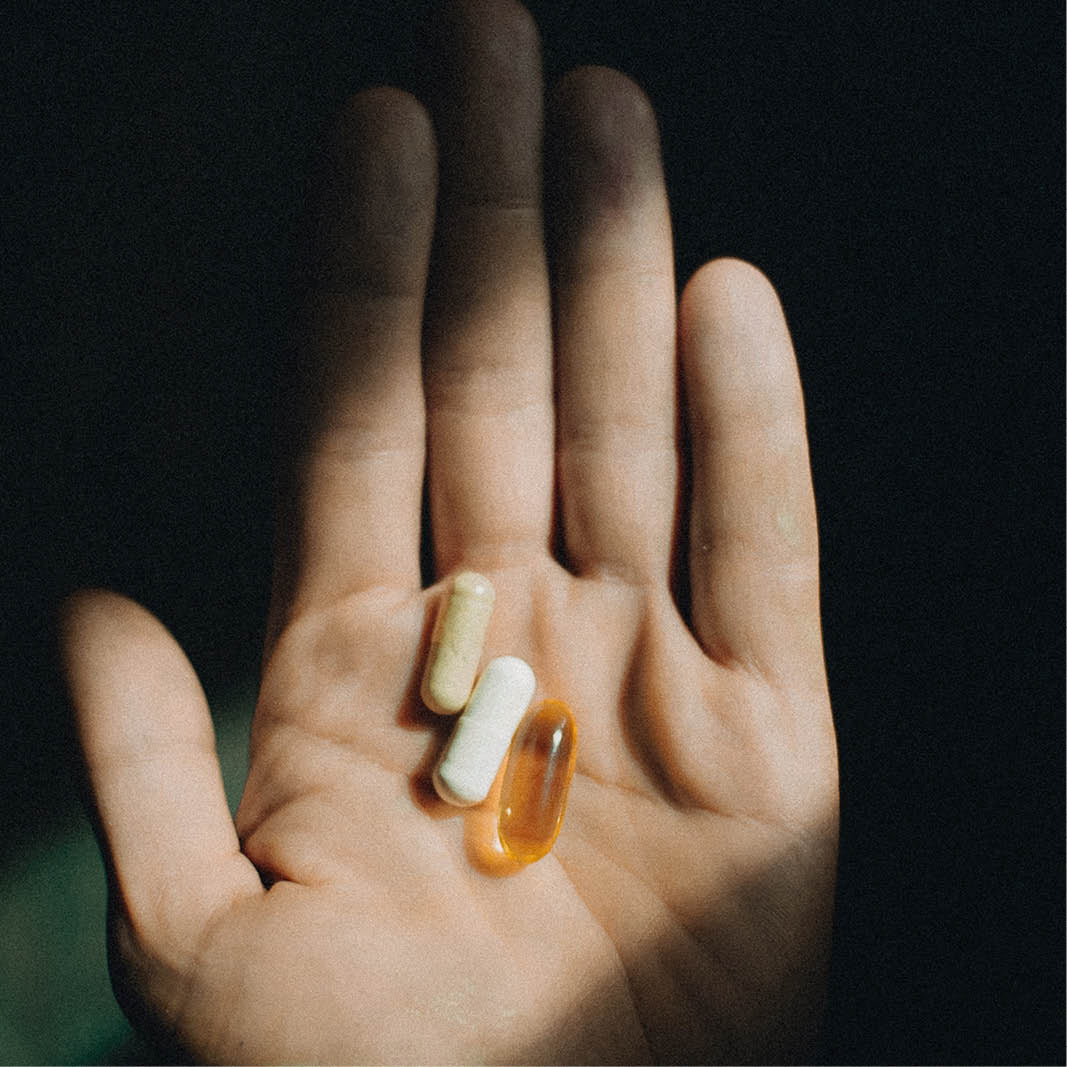 Hand mit Pillen